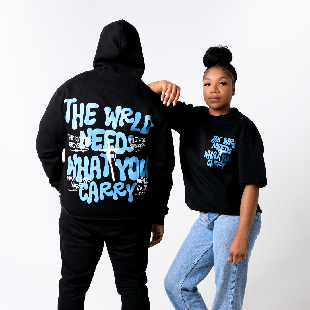 WRLD NEEDS WHAT YOU CARRY HOODIE (BLACK)
