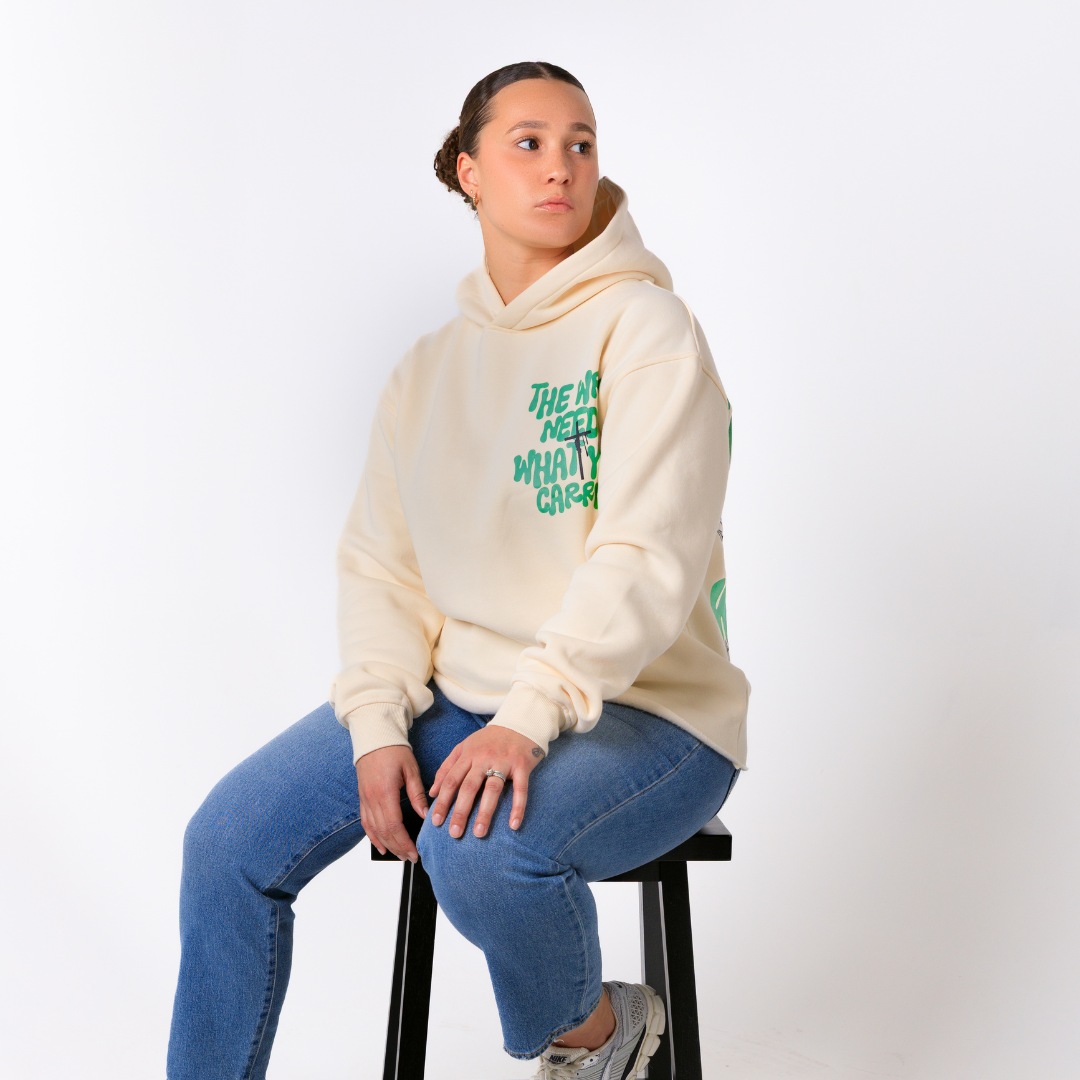WRLD NEEDS WHAT YOU CARRY HOODIE (CREAM)