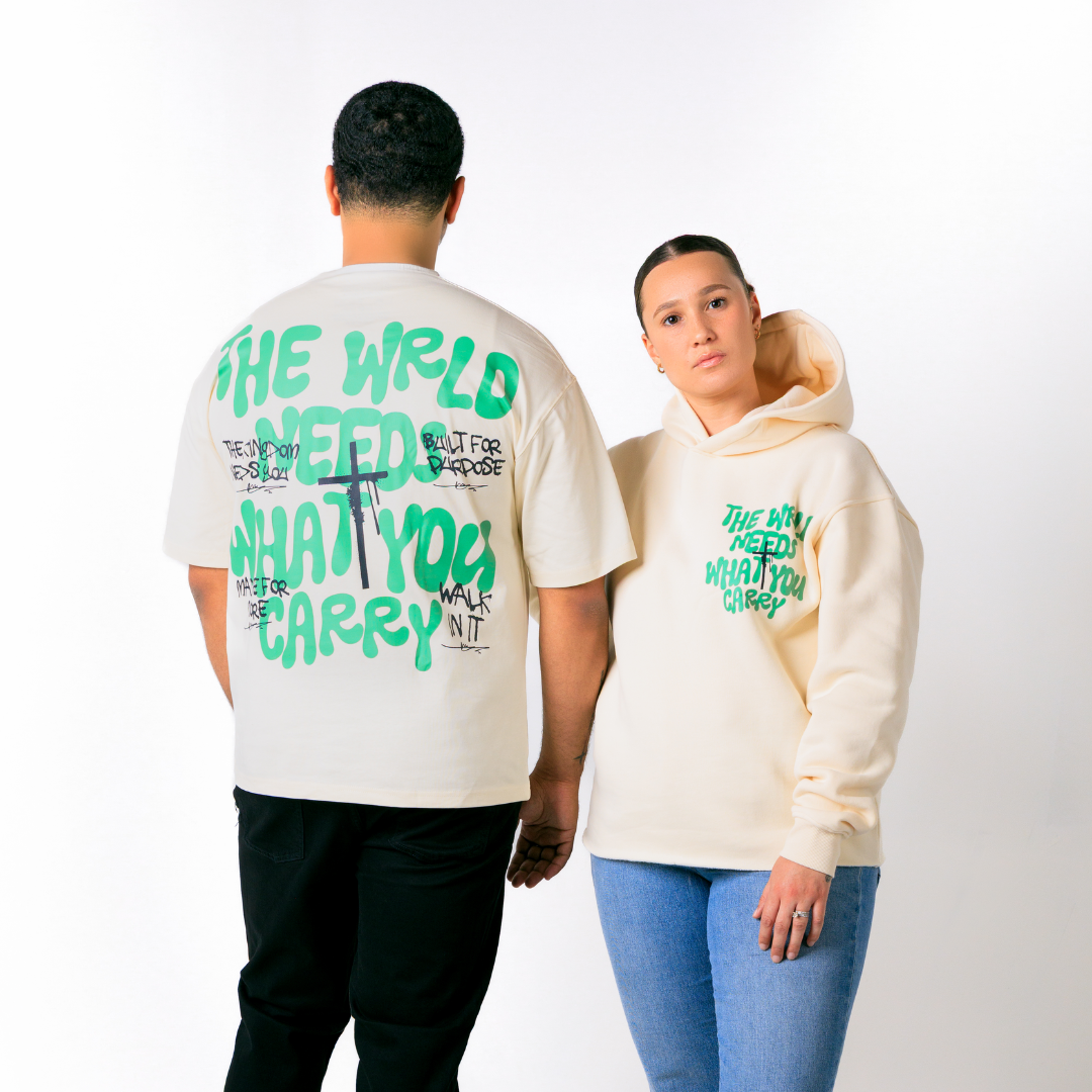 WRLD NEEDS WHAT YOU CARRY HOODIE (CREAM)