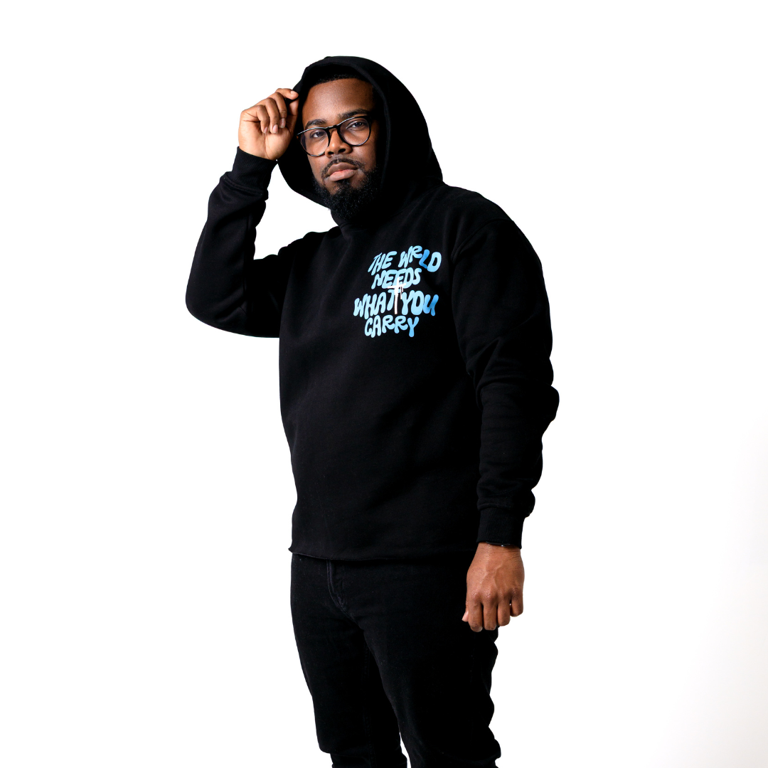 WRLD NEEDS WHAT YOU CARRY TEE (BLACK)