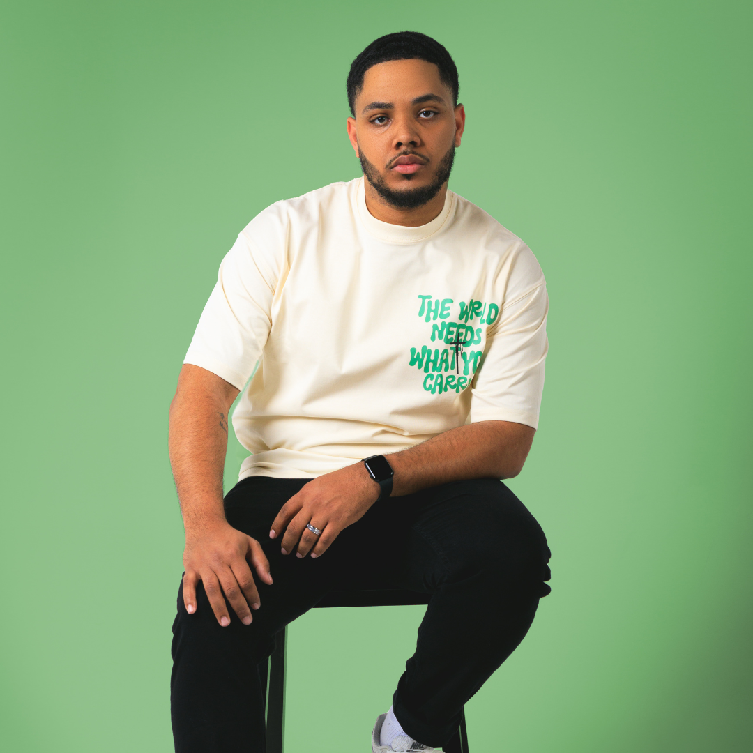 WRLD NEEDS WHAT YOU CARRY TEE (CREAM)